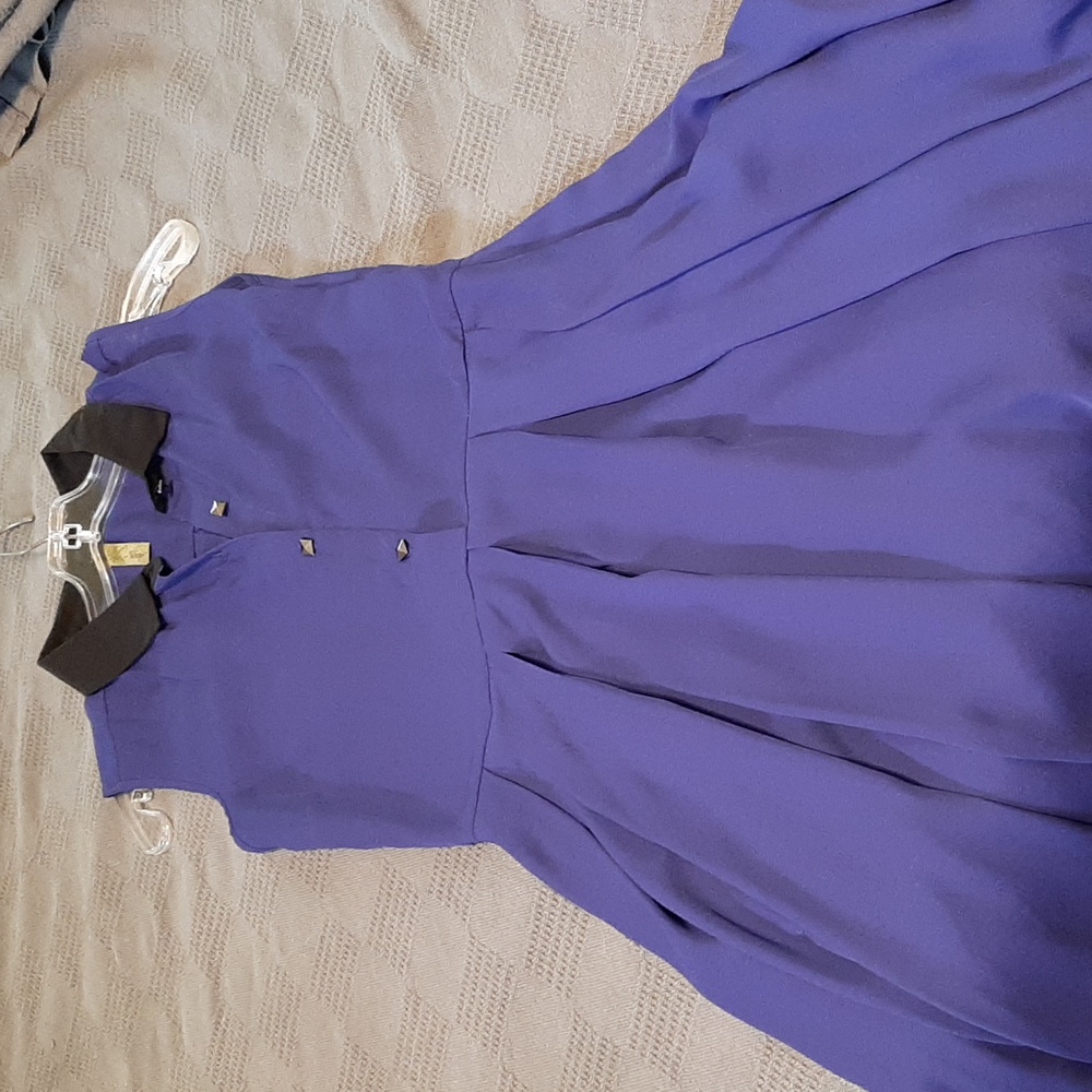 Blue dress with black collar and bottom pleats